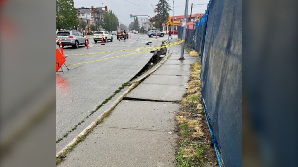 A sinkhole at 201A Street and Fraser Highway is seen in an image handed out by the Langley RCMP on Saturday, Aug. 24. 