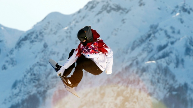 the air during qualification run of the slopestyle snowboard