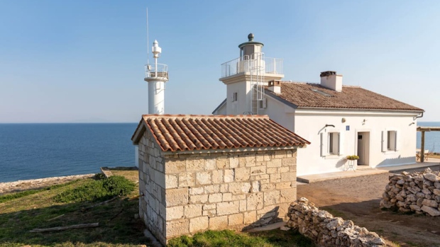 Beachfront lighthouse in Medulin, Croatia