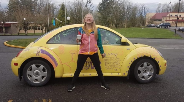 Amy Anonby and her 2000 VW Beatle